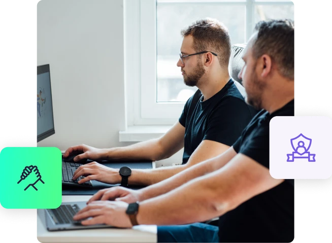 Programiści pracujący przy komputerze